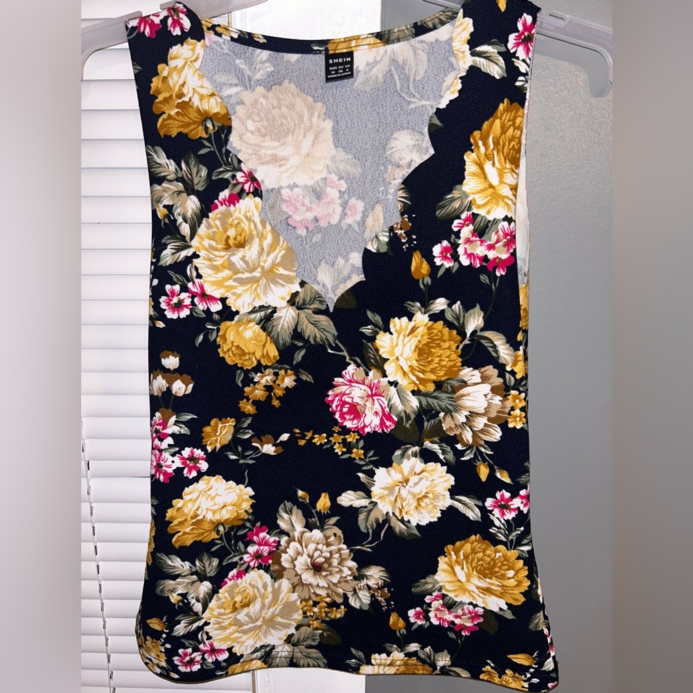 Dress shirt or tank top, you could dress this up or dress this down.